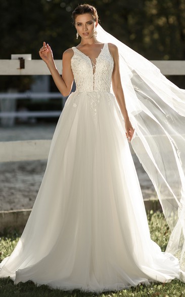 Sexy Brush Train Floor-Length Plunging Neckline Wedding Dress With Appliques