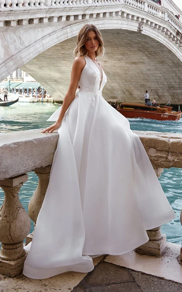 Ball Gown Halter Style Deep V Neckline Sleeveless Organza Satin Wedding Dress with Bow and Appliques