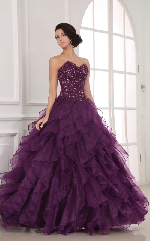 Robe de bal somptueuse en organza à volants et cristaux, coupe trapèze
