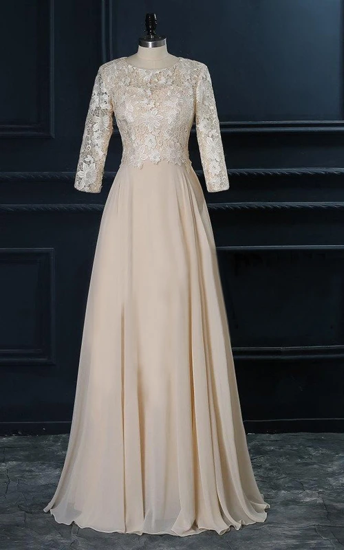 Robe trapèze en jersey à encolure ronde, manches 3-4, avec haut en dentelle et fermeture éclair.