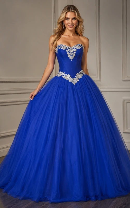 Robe de bal longue en tulle avec corset orné d'appliqués et de bretelles, fermeture éclair au dos.