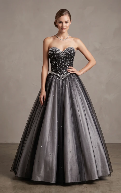 Robe de bal longue en dentelle et tulle, décolleté cœur, cloche et lacets tombants ornés de bijoux