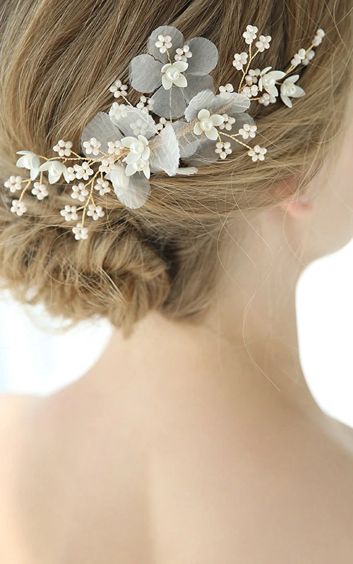 A Pair of Golden Handmade Crystal Hair Combs 